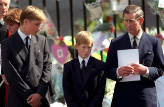 The Prince of Wales with Prince William and Prince Harry outside Westminster Abbey at the funeral of Diana, The Princess of Wales on September 6, 1997.