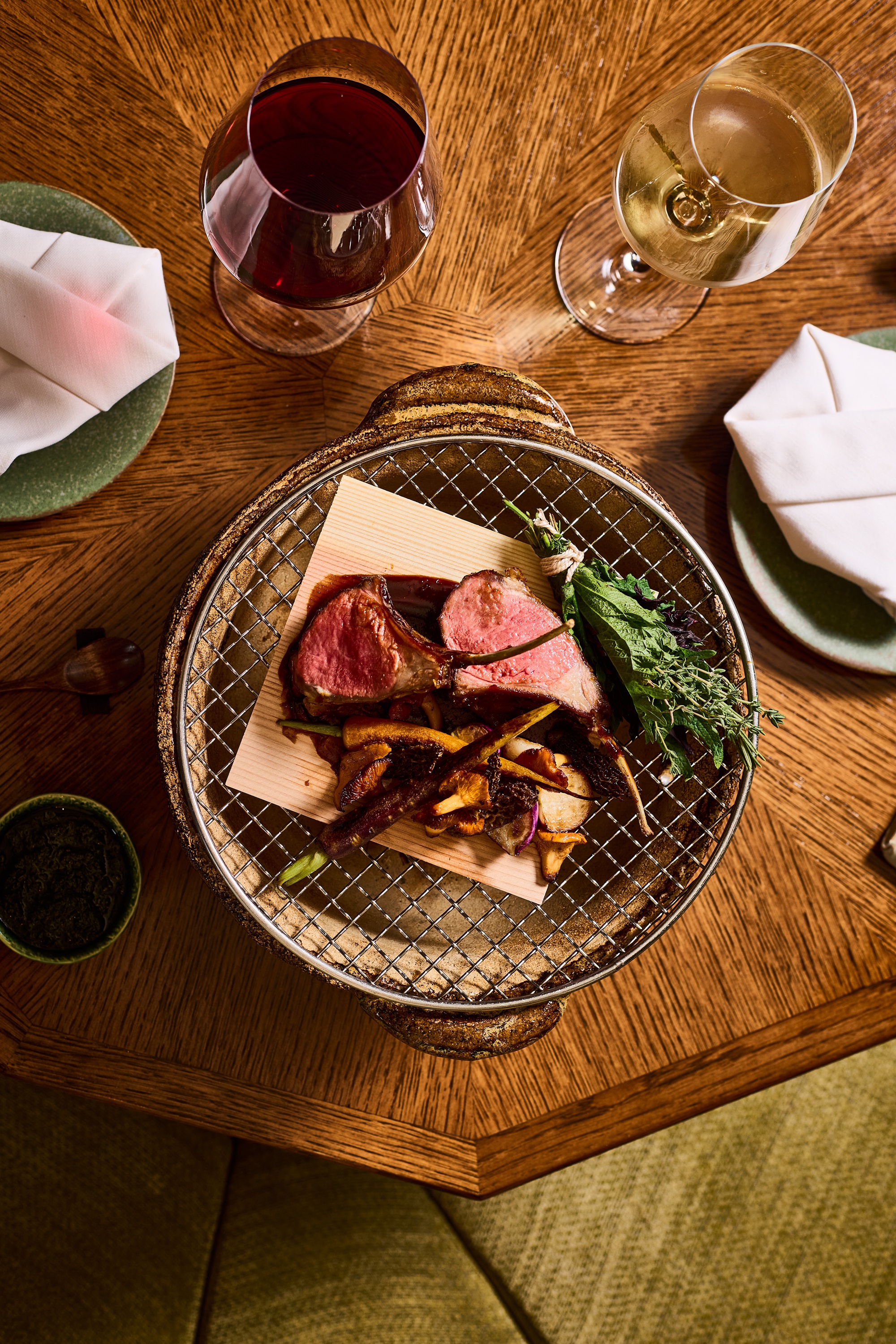 beef served on a konro grill on a table
