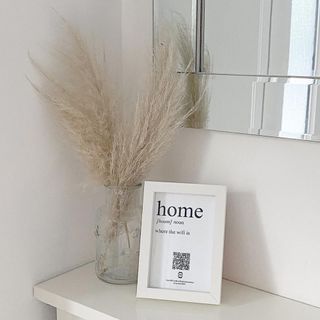 Framed wifi access on shelf with pampas grass