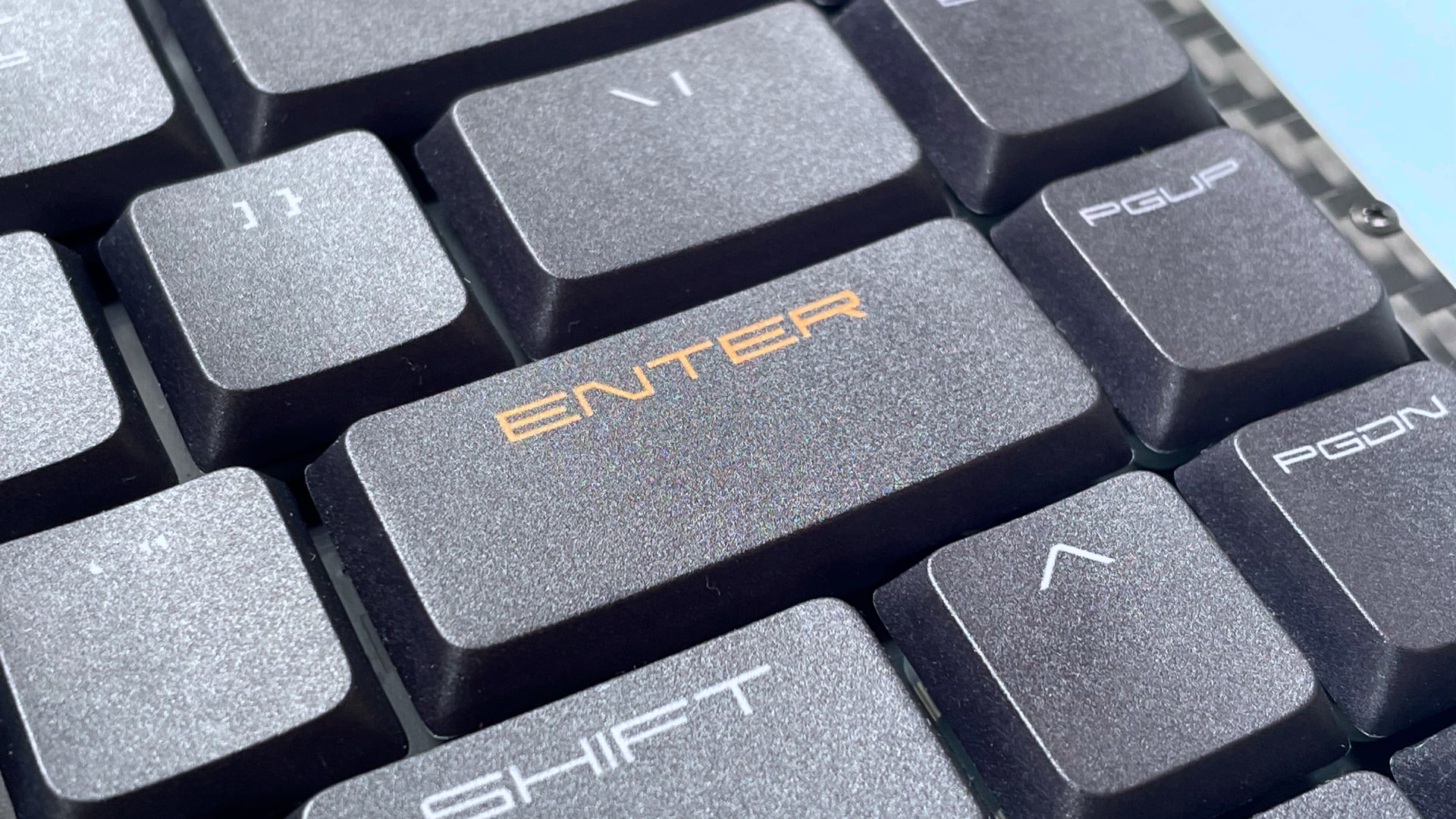 The Lofree Edge keyboard against a blue background.