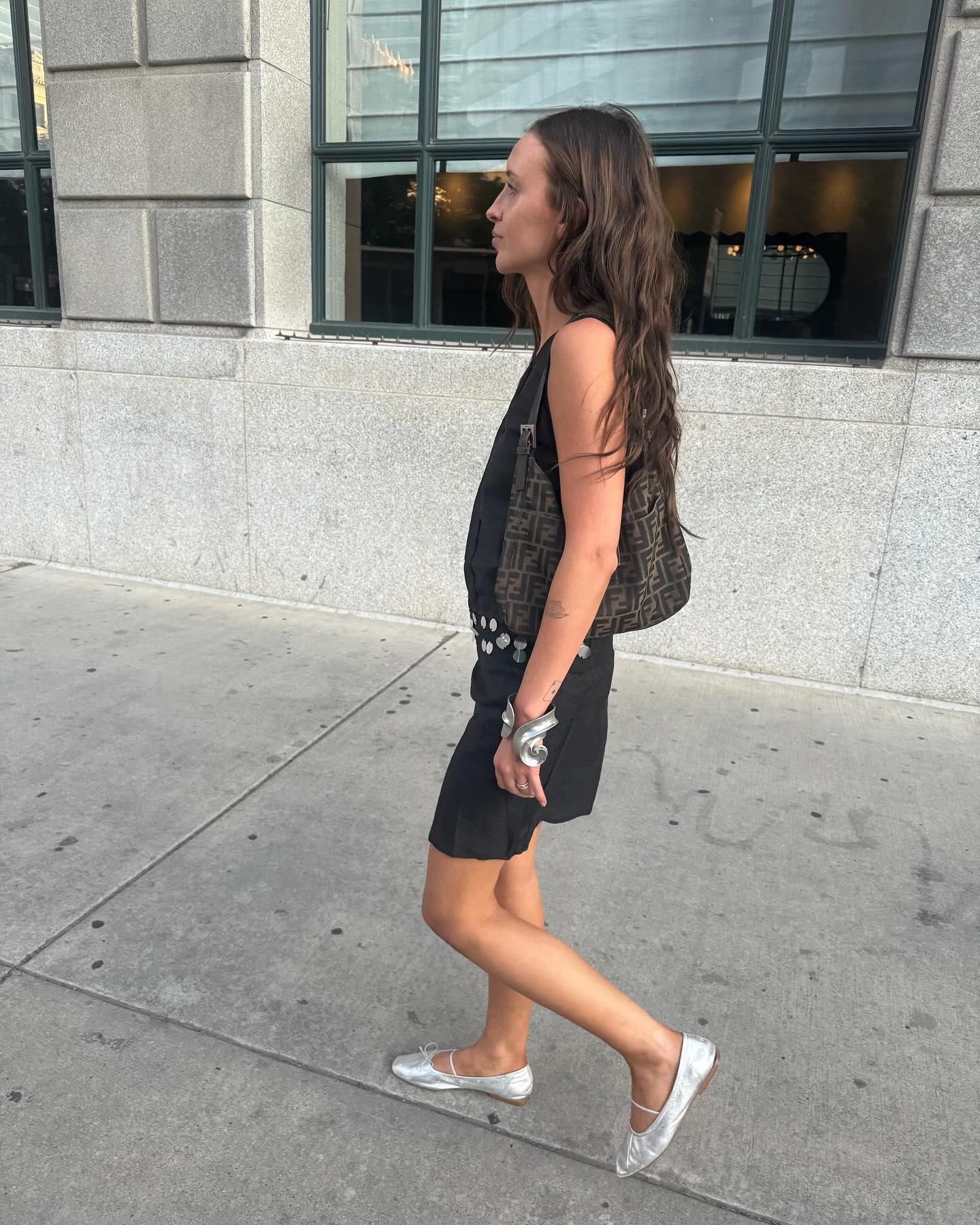 Woman in black dress.