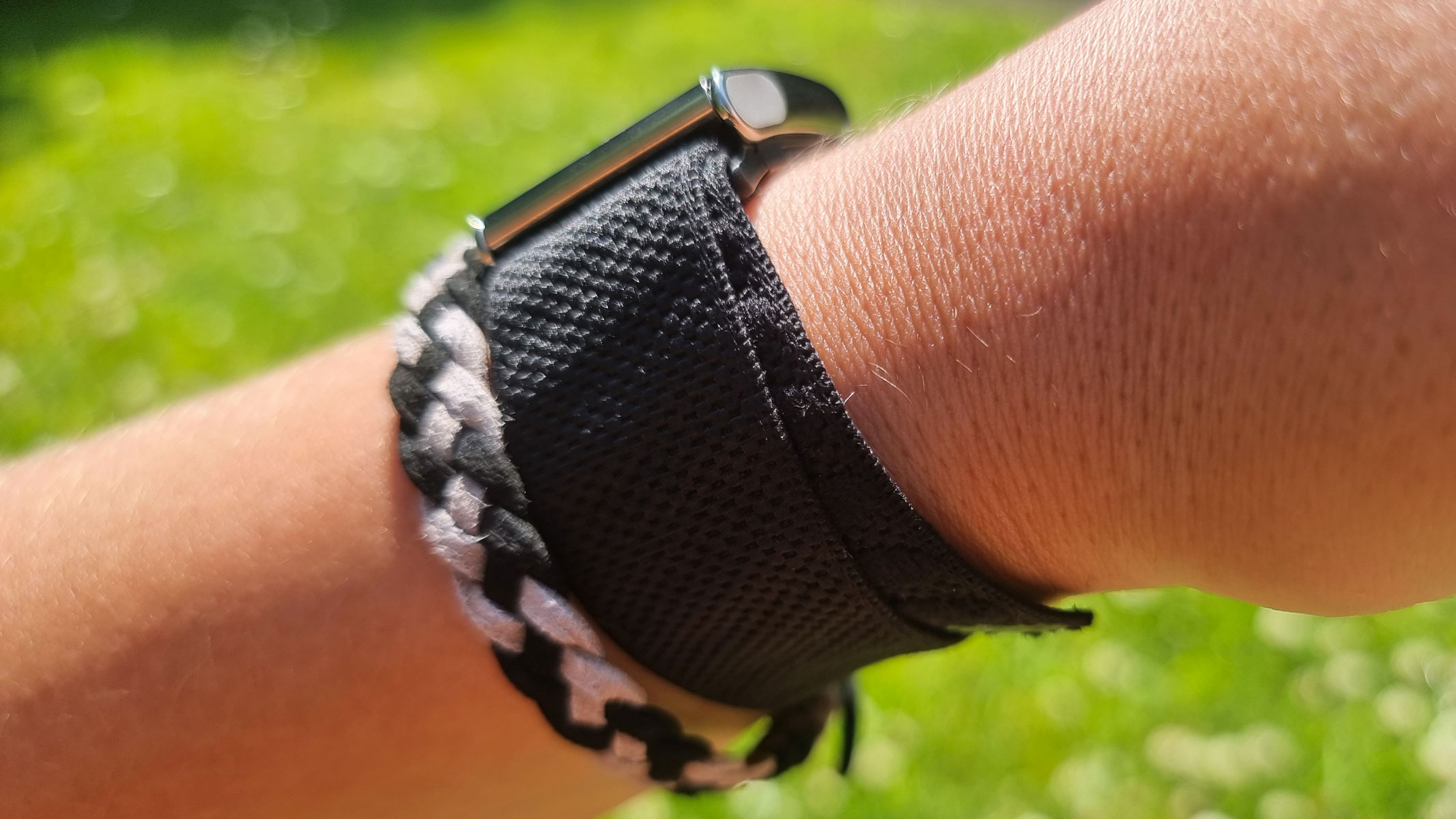 A close-up picture of the metal clasping mechanism in the Whoop MG fitness tracker