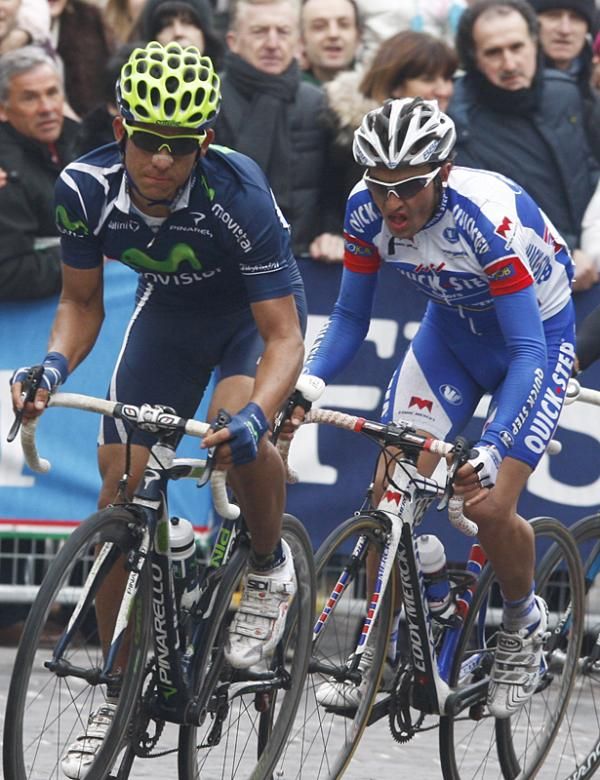 Andrey Amador Bakkazakova (Movistar) and Davide Malacarne (QuickStep) draw near to the end of a long stage
