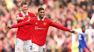 Marcus Rashford of Manchester United celebrates with teammate Wout Weghorst after scoring his side's second goal during the Premier League match between Manchester United and Leicester City at Old Trafford on 19 February, 2023 in Manchester, United Kingdom.