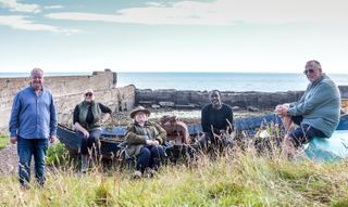 Les, Fern, Rosemary, Linford and Ian relax on Auchmithie beach.