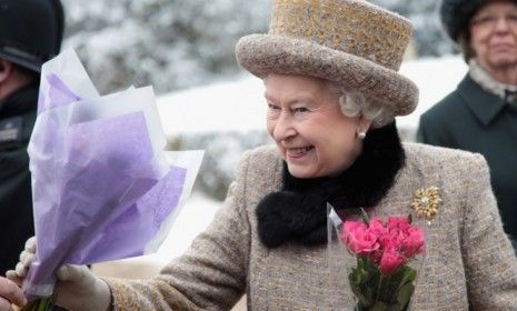 Queen Elizabeth II receives flowers from an admirer on Sunday: On Monday&amp;#039;s Accession Day, England celebrated Elizabeth&amp;#039;s 60 years on the throne.