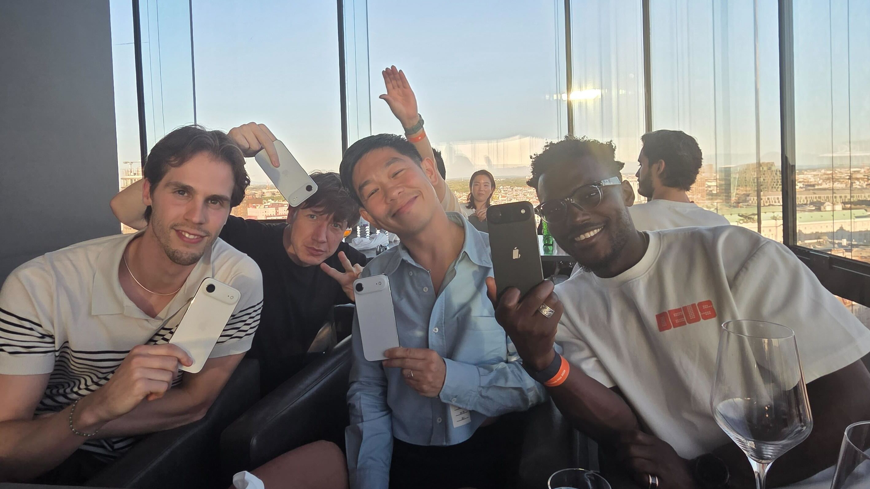 Tech journalists pictured with the iPhone Air