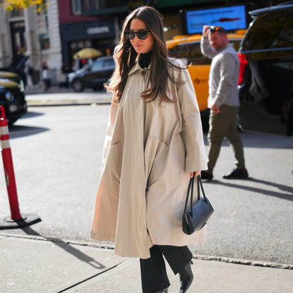 Olivia Munn trench coat black trousers