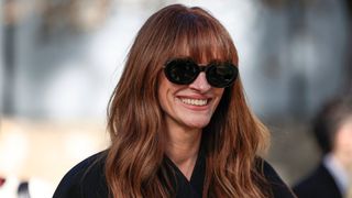 Julia Roberts is seen with dark, copper hair whilst arriving at the Jacquemus Womenswear Ready-to-wear Spring-Summer 2024 collection at Maeght Foundation, in Saint-Paul-de-Vence, southern France, on January 29, 2024.