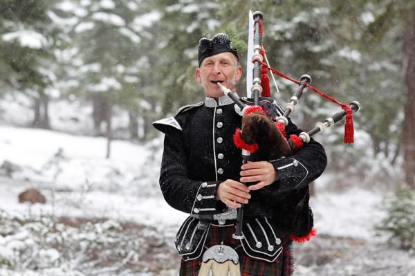Bagpiper Sean Cummings lives in Lake Tahoe and brought some Scottish spirit to the finish line, which was crowded with people even though the race was cancelled