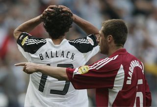 Michael Ballack (left) looks dejected during Germany's 0-0 draw against Latvia at Euro 2004.