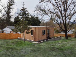 small brown prefab home