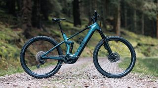 The Cube Stereo Hybrid 140 HPC ABS 750 side on view in Glentress forest, Scotland