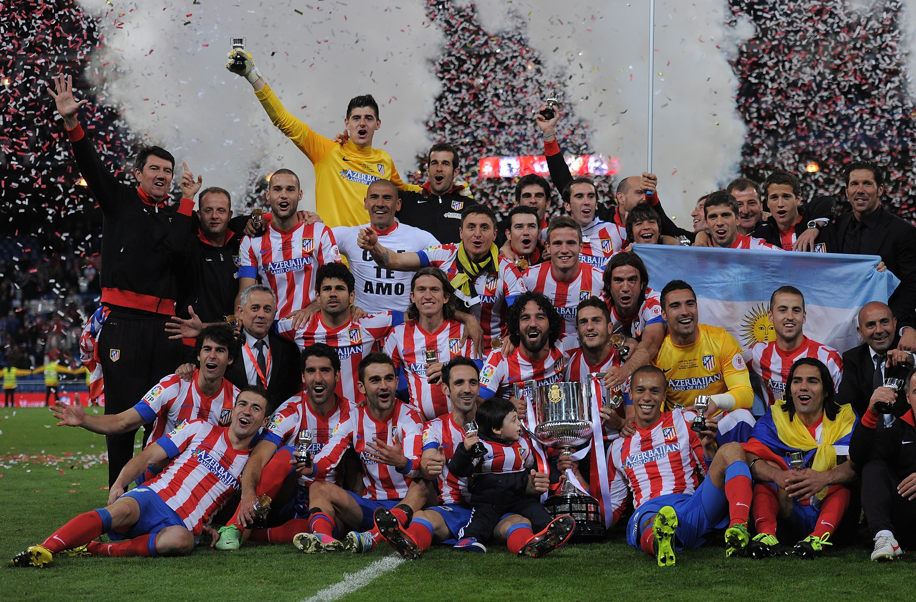 Atletico Madrid players celebrate their Copa del Rey final win over Real Madrid at the Santiago Bernabeu in May 2013.