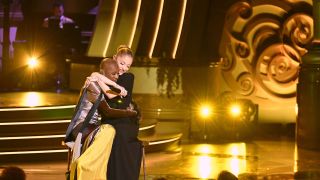 Cynthia Erivo and Ariana Grande hugging on stage during the taping of Wicked: One Wonderful Night