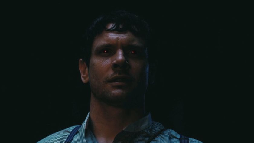 Jack O'Connell's Remmick looking at the music coming from the Juke Joint.