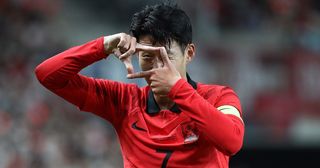 Son Heung-Min of South Korea celebrates after scoring his team's first goal during the South Korea v Cameroon - International friendly match at Seoul World Cup Stadium on September 27, 2022 in Seoul, South Korea