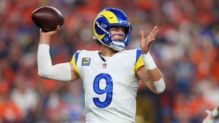 Matthew Stafford, wearing the No.9 jersey of the LA Rams, throws a pass during the NFL 2026 season