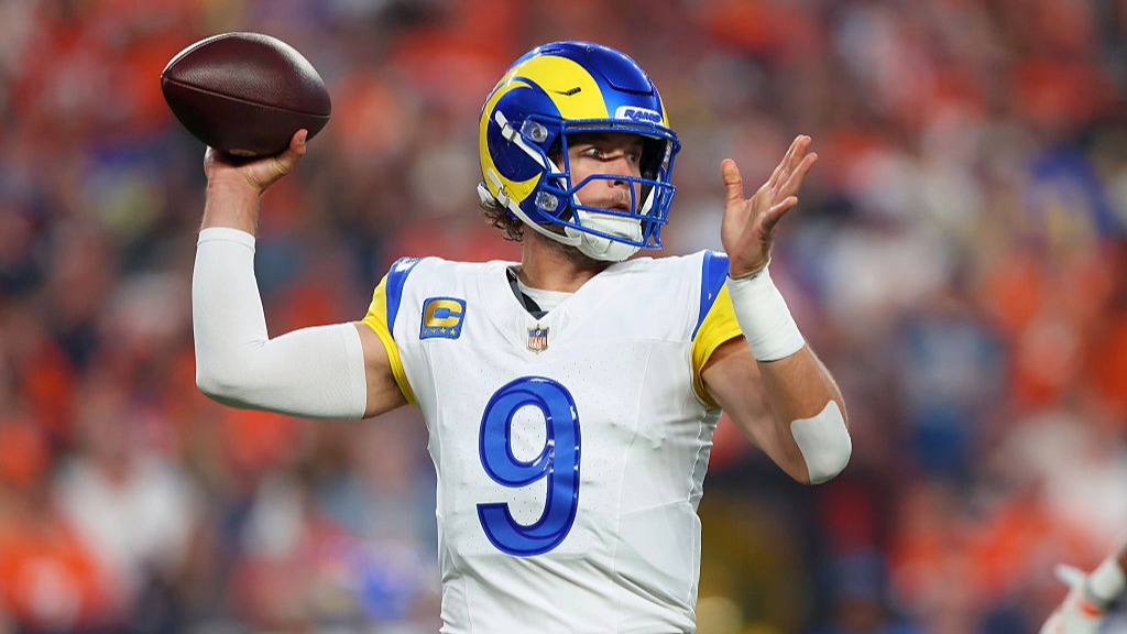 Matthew Stafford, wearing the No.9 jersey of the LA Rams, throws a pass during the NFL 2026 season