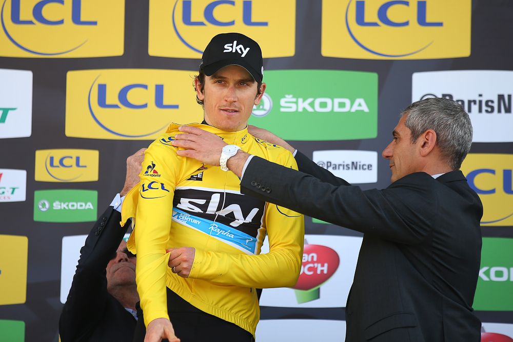 Greraint Thomas puts on the final yellow jersey at Paris-Nice