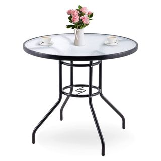 A glass table with black legs