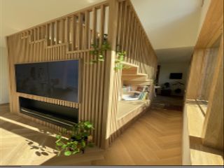 Wooden wall paneling with tv unit, bookshelf and stairway