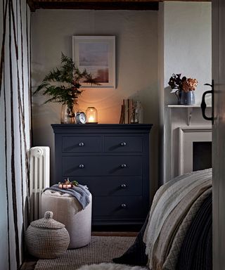 Christmas bedroom decor ideas with black painted chest of drawers