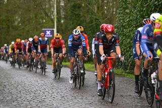 The peloton ride over the Broekstraat cobbled section at Scheldeprijs 2024.