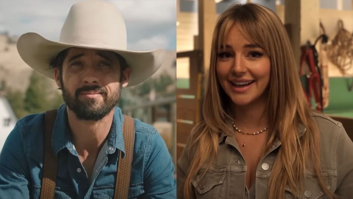 From left to right: Ryan Bingham wearing a big white cowboy hat and Hassie Harrison smiling while standing in a barn.