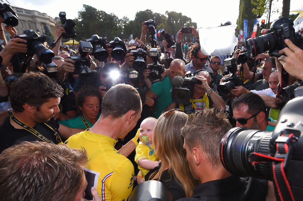 Chris Froome with son Kellan and wife Michele after crossing the line and sealing his third Tour win