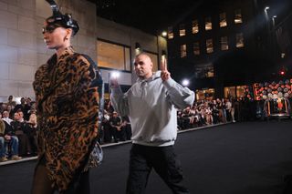 Raul Lopez walking out at the end of Luar Spring 2025 runway show at New York Fashion Week