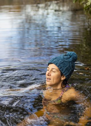 Woman wild swimming