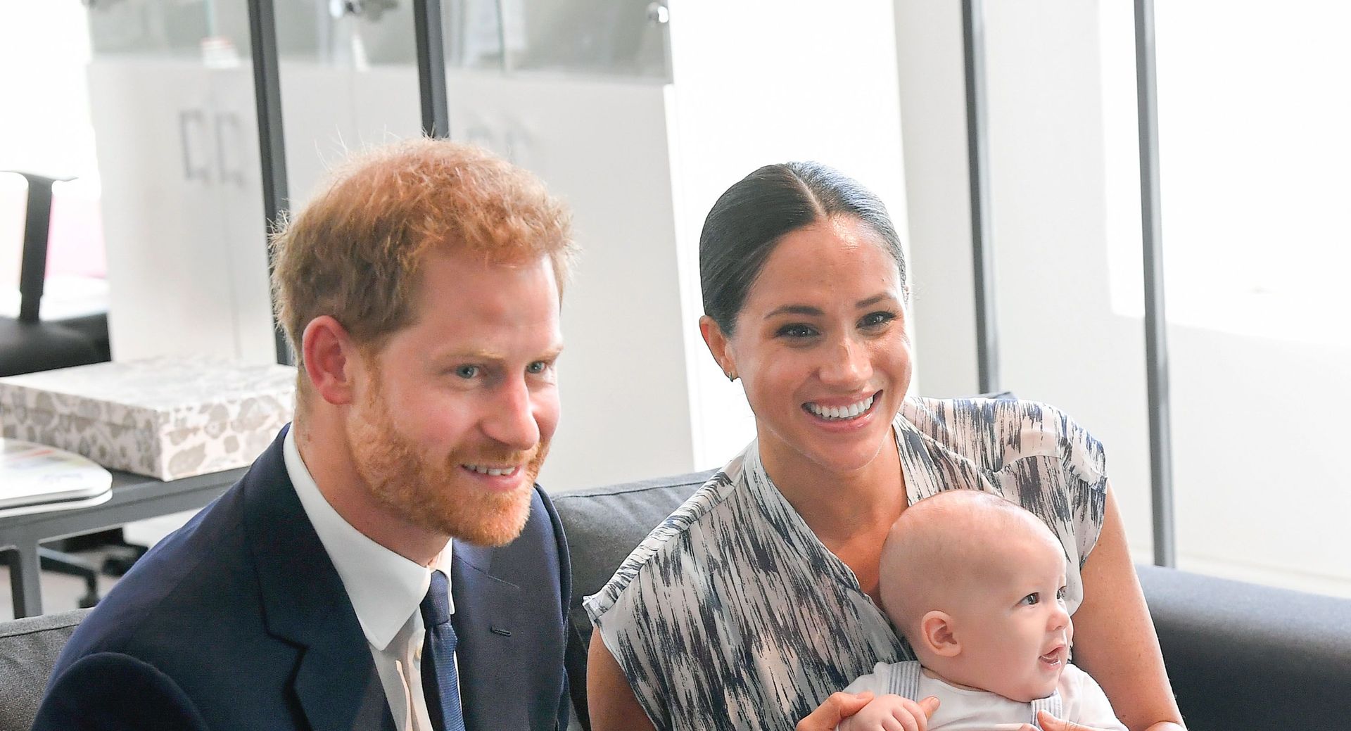britain's prince harry and his wife meghan, duchess of sussex, holding their son archie, meet archbishop desmond tutu at the desmond leah tutu legacy