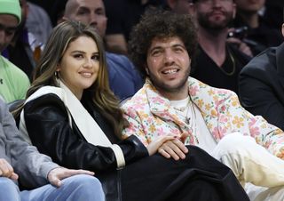 Actress Selena Gomez, left, and actor Benny Blanco during the first half of an NBA basketball game between the Los Angeles Lakers at Crypto.com Arena in Los Angeles Wednesday, Jan. 3, 2024.