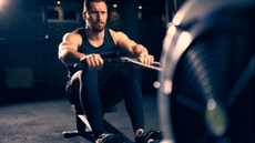 Man rowing on rowing machine