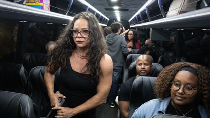 Texas Democrats board a bus in Illinois after leaving Texas to block redistricting vote