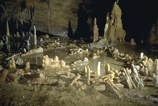 Scientists have dated constructions made with broken stalagmites inside the Bruniquel Cave in southwestern France.