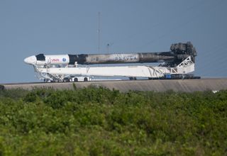 A close-up view of Crew-4's Falcon 9 rocket and Dragon capsule during their rollout on April 19, 2022.