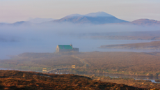 A fisherman's bothy shrouded in mist on the Isle of Lewis in the Outer Hebrides of Scotland