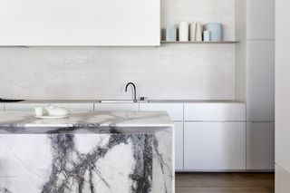 Kitchen area with white marble