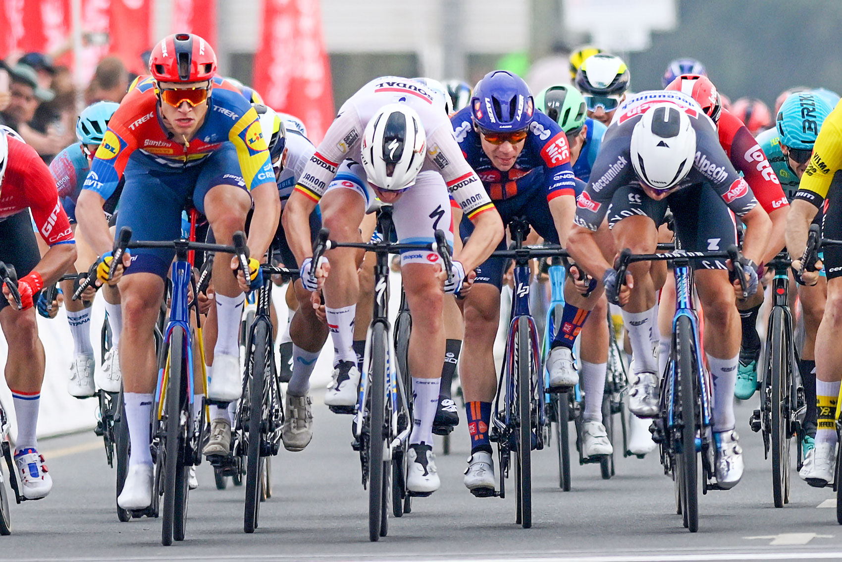 QIDFA, UNITED ARAB EMIRATES - FEBRUARY 20: (L-R) Jonathan Milan of Italy and Team Lidl-Trek, Tim Merlier of Belgium and Team Soudal Quick-Step, Fabio Jakobsen of The Netherlands and Team Picnic PostNL, Jasper Philipsen of Belgium and Team Alpecin-Deceuninck sprint at finish line during the 7th UAE Tour 2025, Stage 4 a 181km stage from Fujairah Qidfa Beach to Umm al Quwain / #UCIWWT / on February 20, 2025 in Fujairah Qidfa Beach, United Arab Emirates. (Photo by Dario Belingheri/Getty Images)