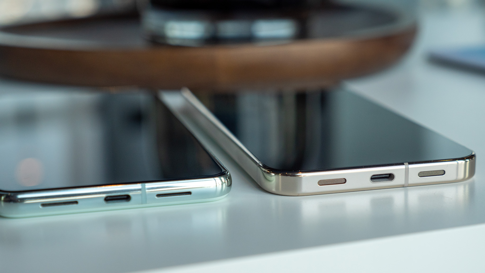 Comparing the mint Google Pixel 8 Pro's design to the jade Google Pixel 10 Pro XL's design