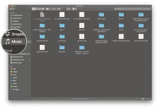 Launch Finder, click Music