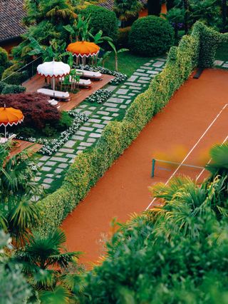 Tennis court and sun loungers