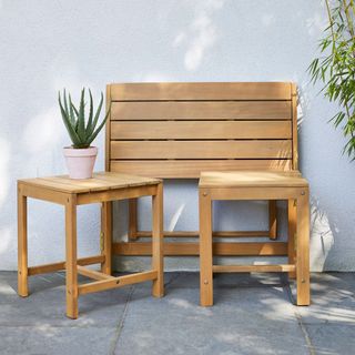 wooden foldable desk wooden seats and plant