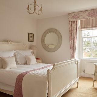 white themed bedroom with carpet flooring