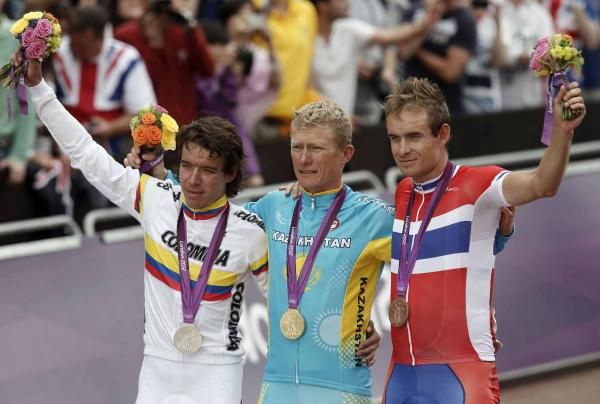 Rigoberto Uran (Colombia), Alexandre Vinokourov (Kazakhstan) and Alexander Kristoff (Norway) on the podium.