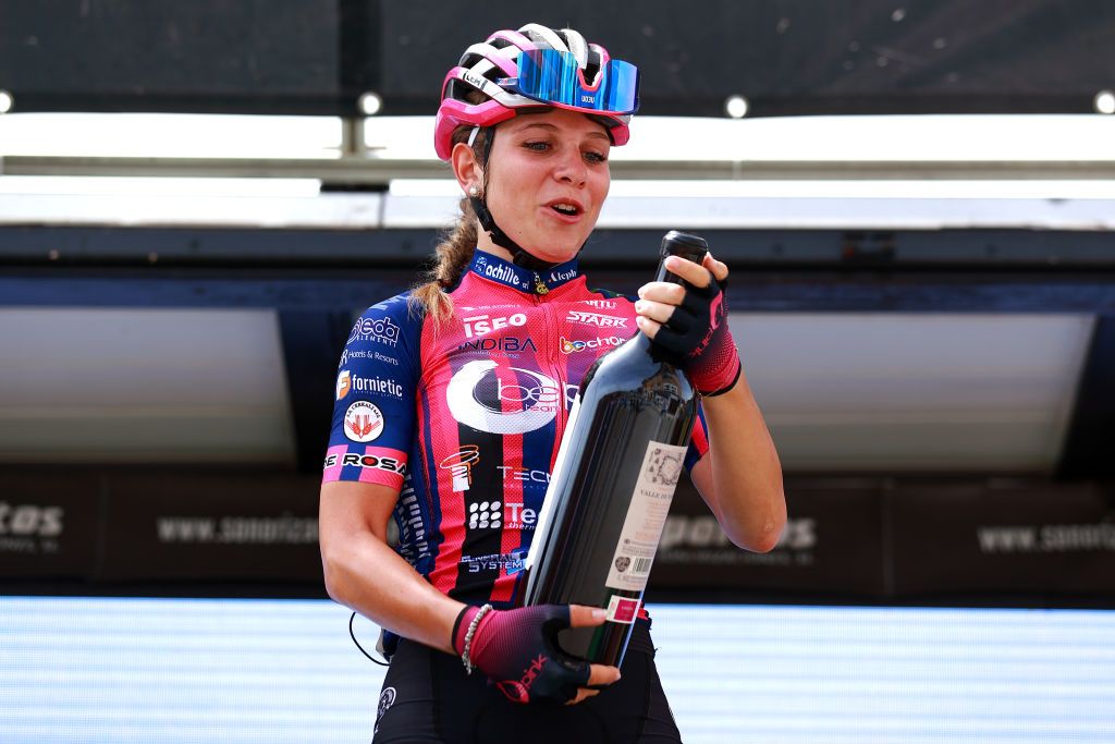 AGUILAR DE CAMPOO SPAIN MAY 20 Matilde Vitillo of Italy and Team Bepink celebrates winning the stage on the podium ceremony after the 7th Vuelta a Burgos Feminas 2022 Stage 2 a 128km stage from Sasamn to Aguilar de Campoo VueltaBurgos BurgosFem UCIWWT on May 20 2022 in Aguilar de Campoo Spain Photo by Gonzalo Arroyo MorenoGetty Images