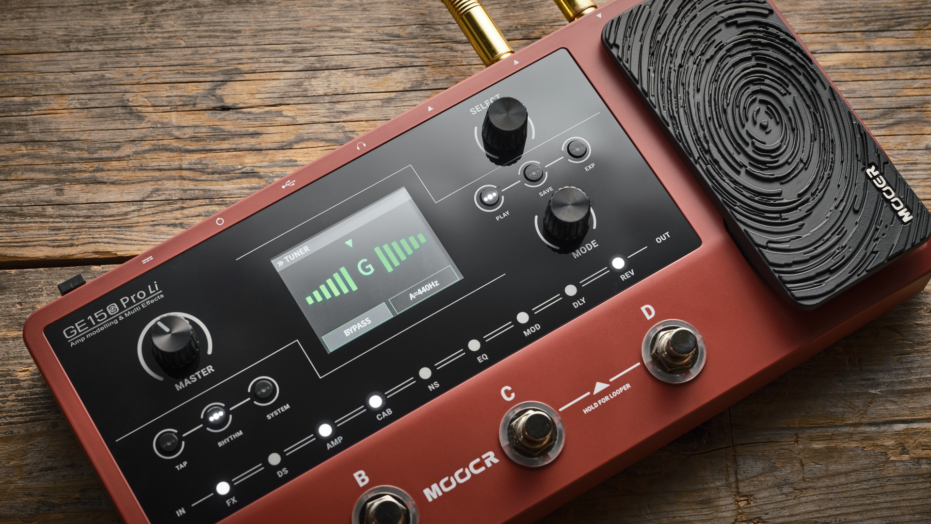 Mooer GE150 Pro li on wooden floor