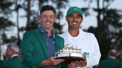 Rory McIlroy and Harry Diamond pose with The Masters trophy